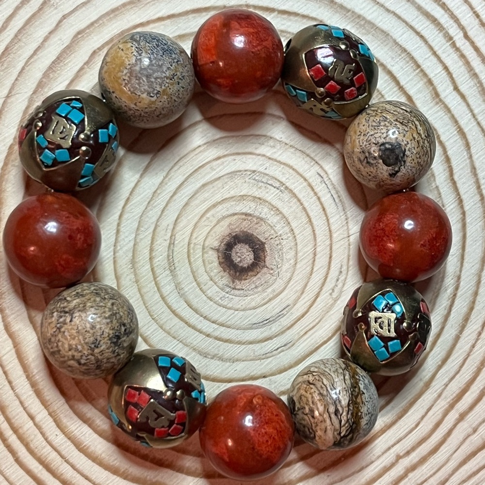 Elegant Beaded Bracelet with Red and Brown Accents